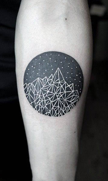 Circular negative space geometric mountains and stars tattoo