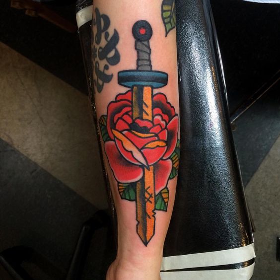 Classic adventure time sword and rose tattoo by jon larson