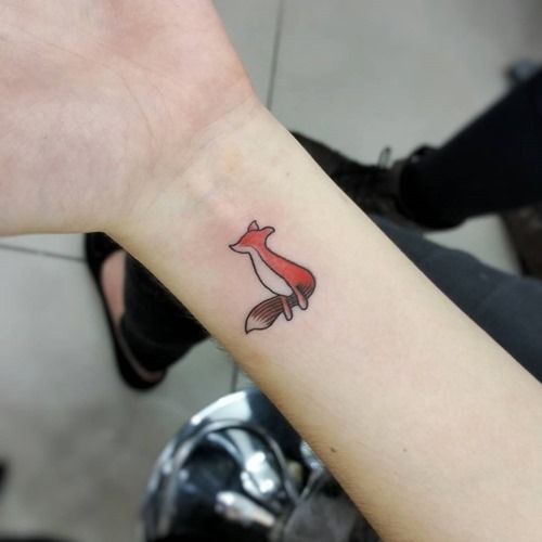 Cute small fox tattoo on the right inner wrist