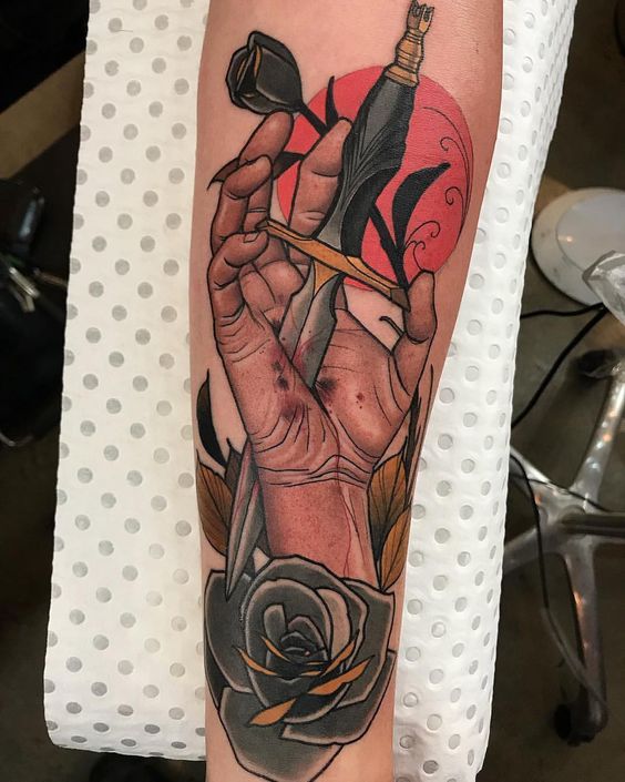 Dagger stabbed hand and flowers