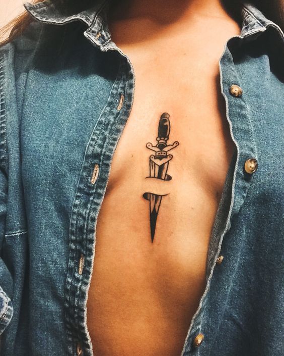 Dagger stabbed sternum tattoo