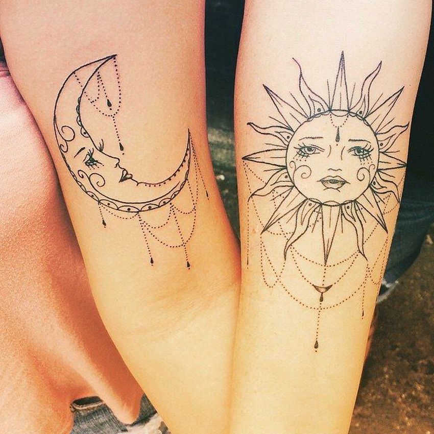 Delicate sun and moon tattoos on both arms.
