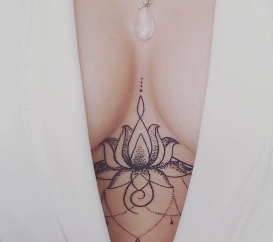 Dot work lotus flower sternum tattoo