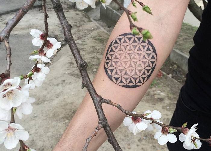 Dotwork black flower of life tattoo