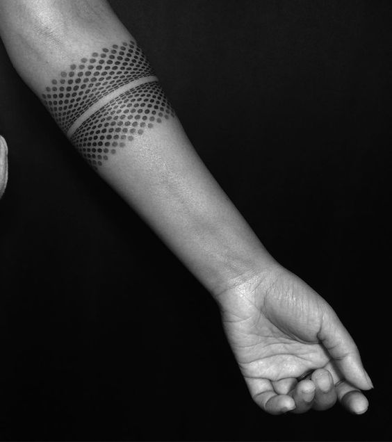 Dotwork circular geometric armband tattoo