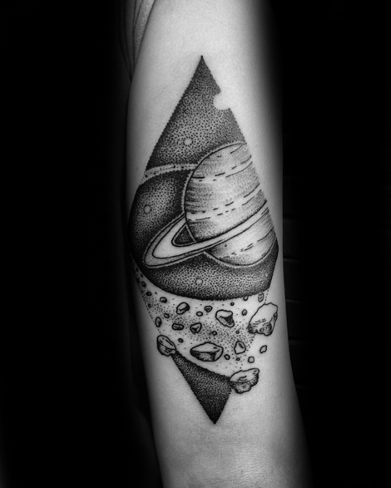 Dotwork rhombus tattoo of saturn and its rings