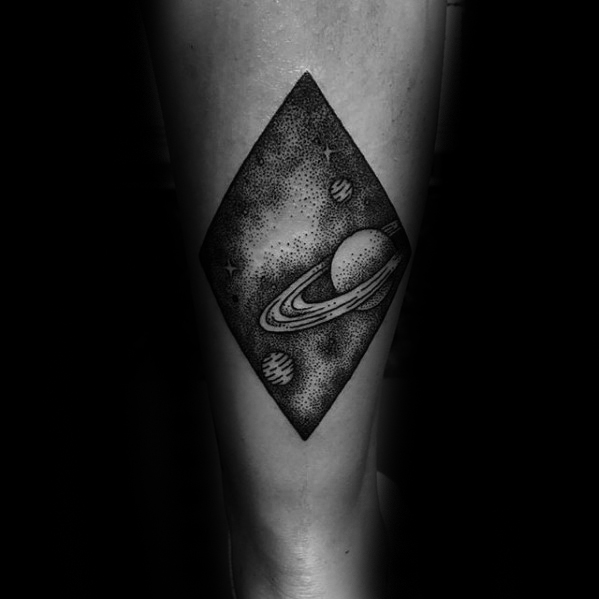 Dotwork style saturn and other planets in a rhombus tattoo