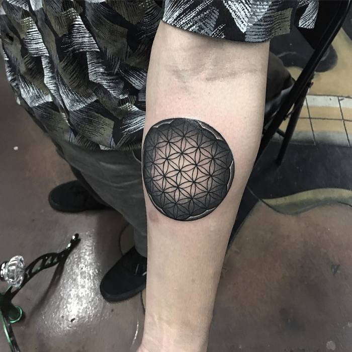 Flower of life tattoo with a gradient background