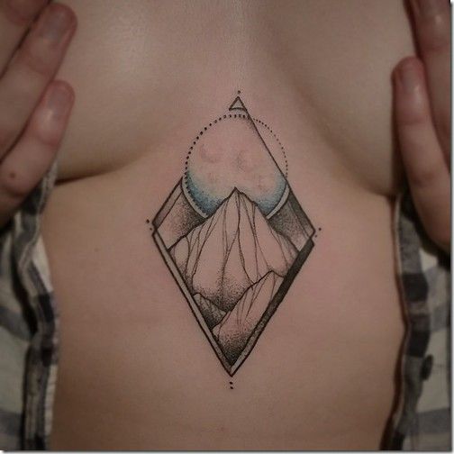 Geometric mountain and sun sternum tattoo