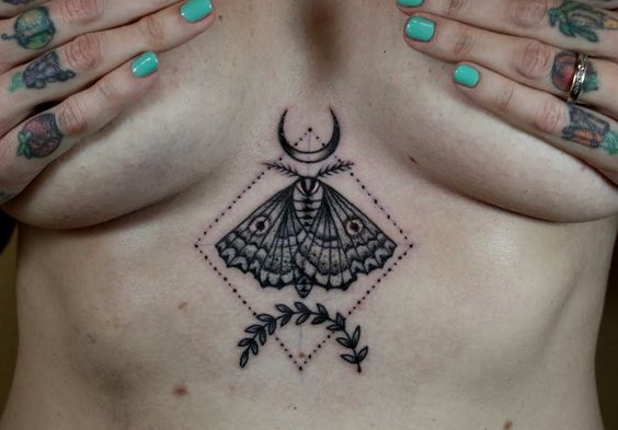 Gorgeous butterfly sternum tattoo