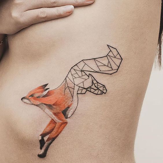 Half real half geometric fox tattoo on the left rib cage