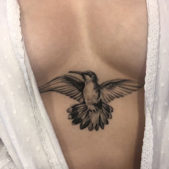 Hummingbird sternum tattoo