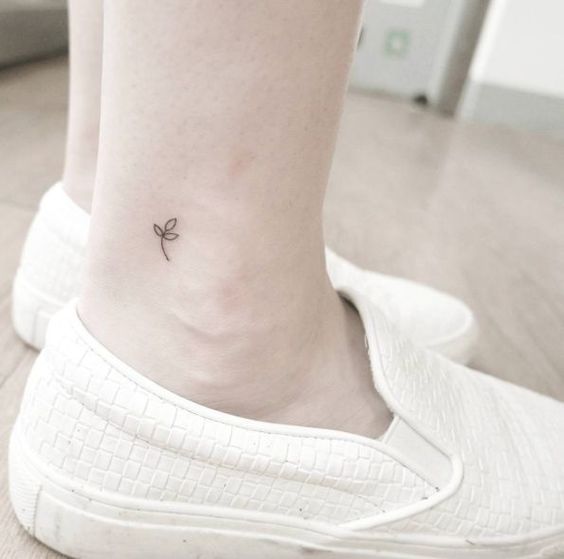 Little leaf tattoo on the ankle by chaewa more