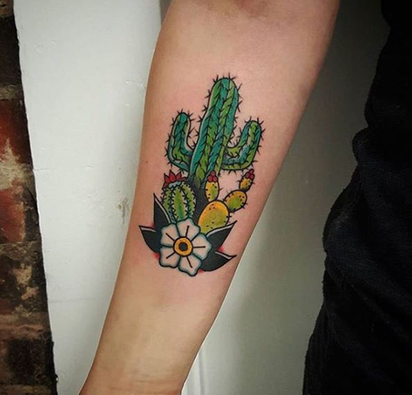 Mama cactus and two baby cactus tattoo on the right inner arm