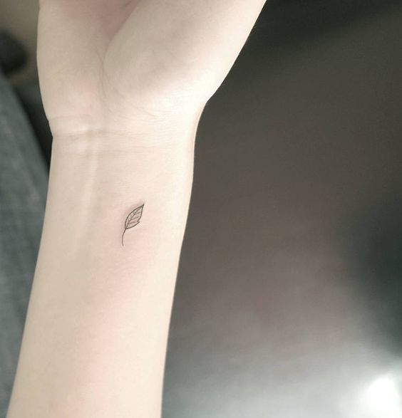 Micro leaf tattoo on the wrist