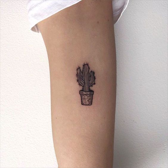 Minimal black tattoo of a cactus in a pot