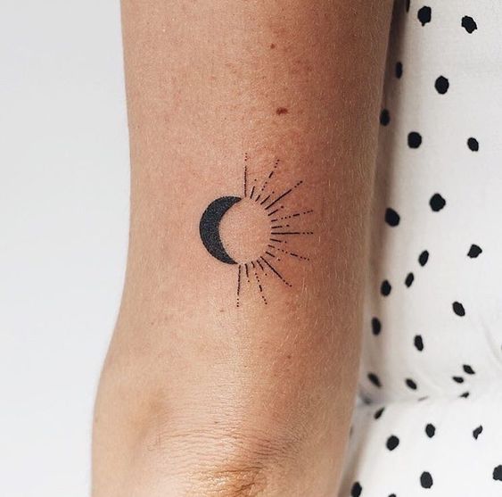 Minimalist black small moon and sun tattoo