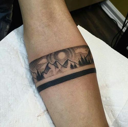 Mountainous landscape armband tattoo
