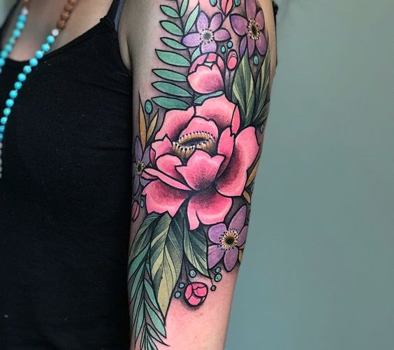 Neo traditional wildflowers tattoo on the left upper arm
