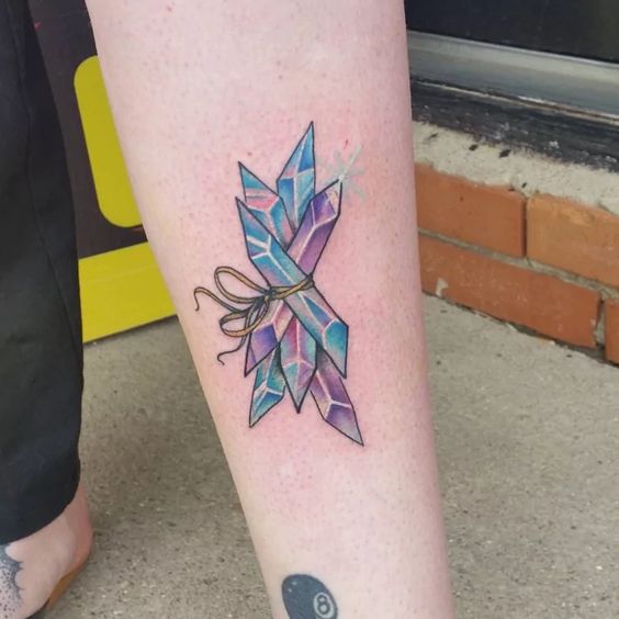 Purple and blue crystal bundle tattoo by samantha leyes