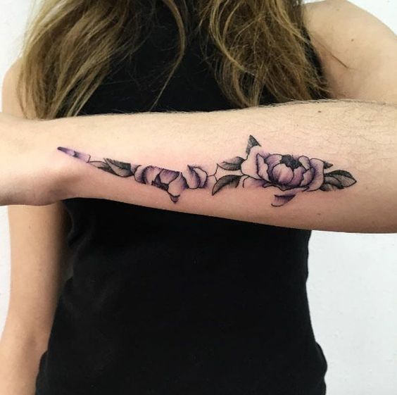 Shark with a floral background on the left forearm by vlada shevchenko