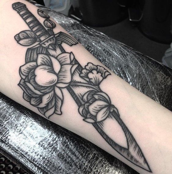 Short black sword with the flowers