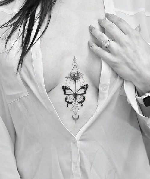 Small butterfly and geometric shapes sternum tattoo