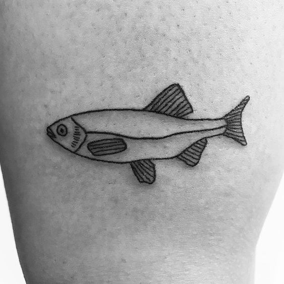 Small outline fish tattoo