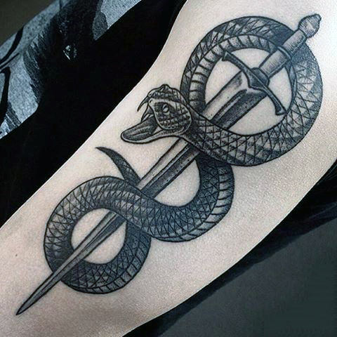 Snake and sword black tattoo
