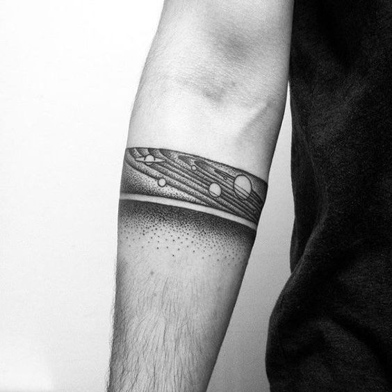 Solar system landscape armband tattoo