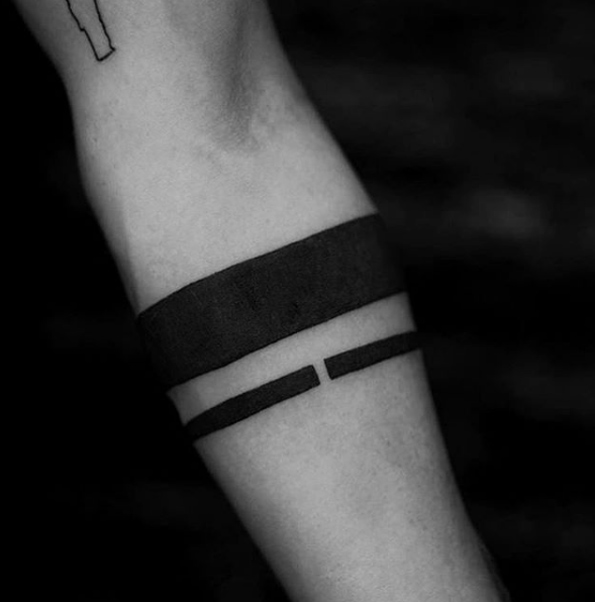 Solid black armband tattoo