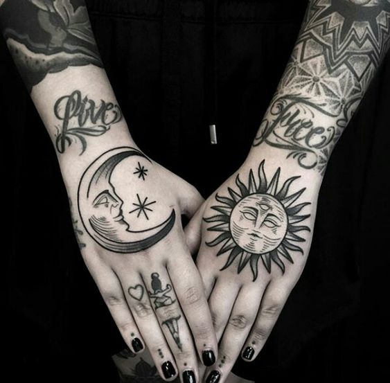 Sun and moon hand tattoos
