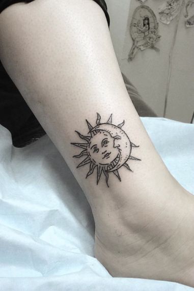 Sun and moon on ankle tattoo