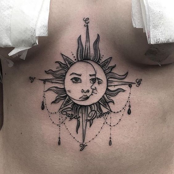 Sun and moon sternum tattoo.