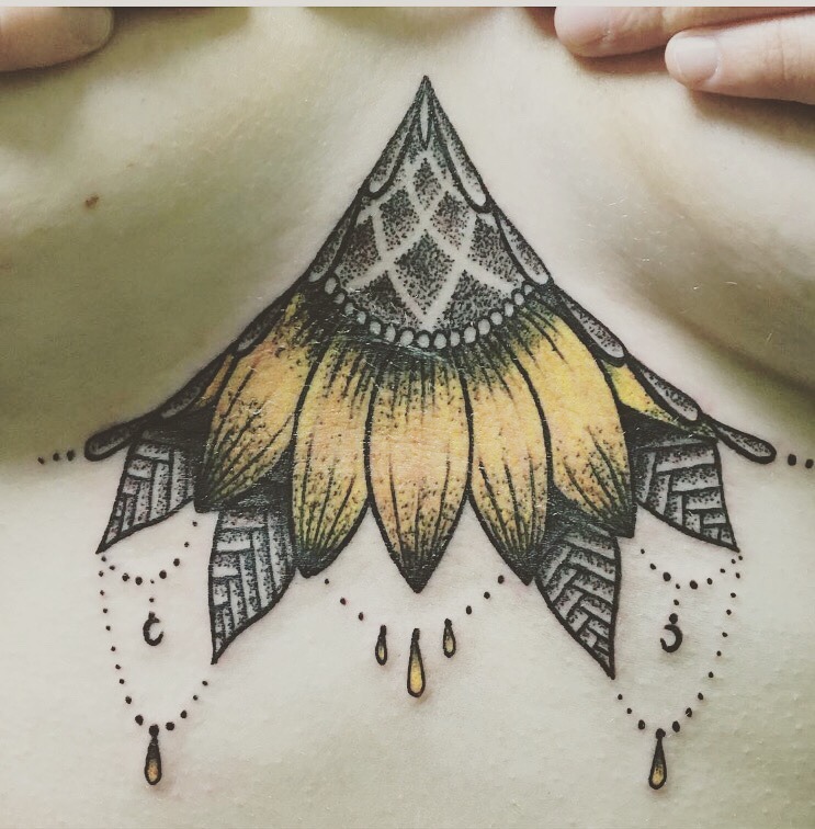 Sunflower mandala sternum tattoo