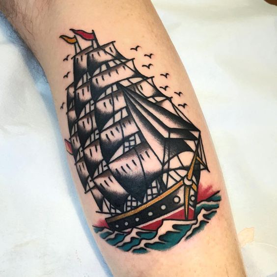 Three masted traditional ship tattoo on the arm