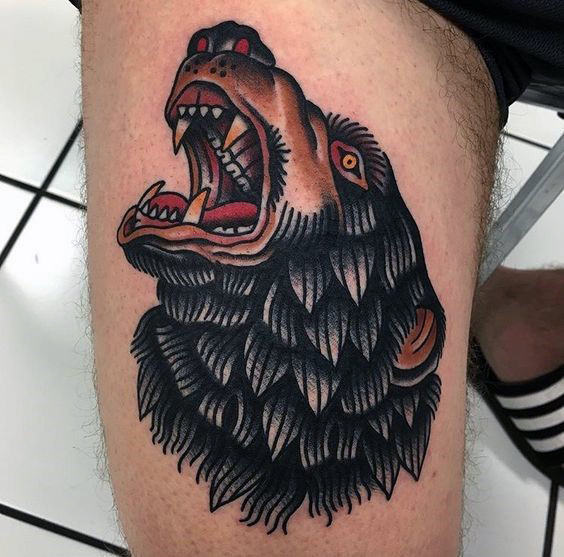 Traditional bear ink on the right thigh