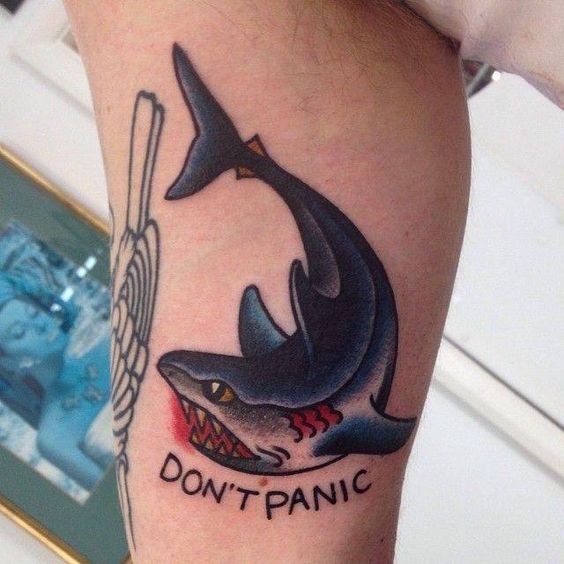 Traditional shark tattoo with the words dont panic by kerry chabot