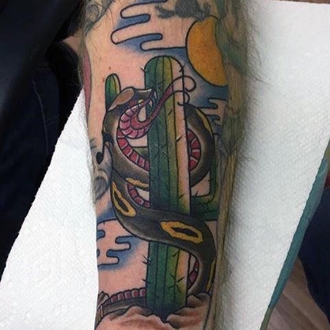 Traditional snake wrapped around the cactus tattoo