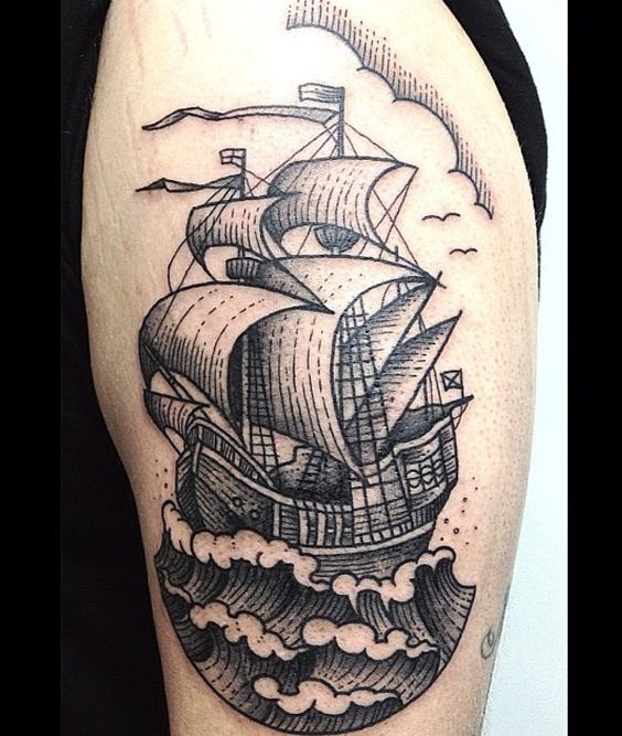 Two masted barque ship and huge waves tattoo on the left bicep