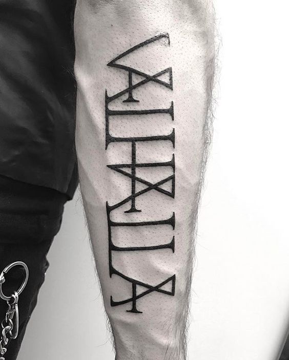Valhalla tattoo on the right forearm