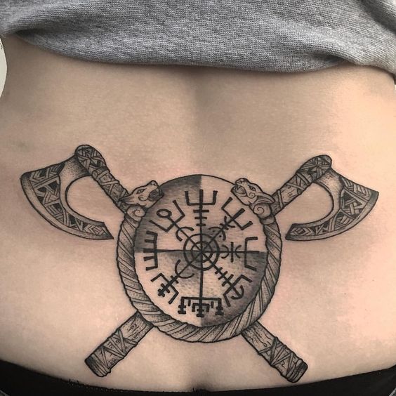 Viking axes and shield vegisvir ouroboros and runes tattoo on the lower back