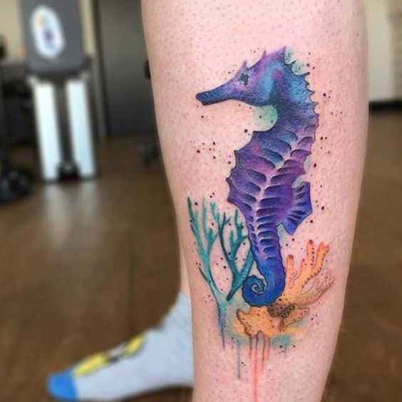 Violet watercolor seahorse on the left shin