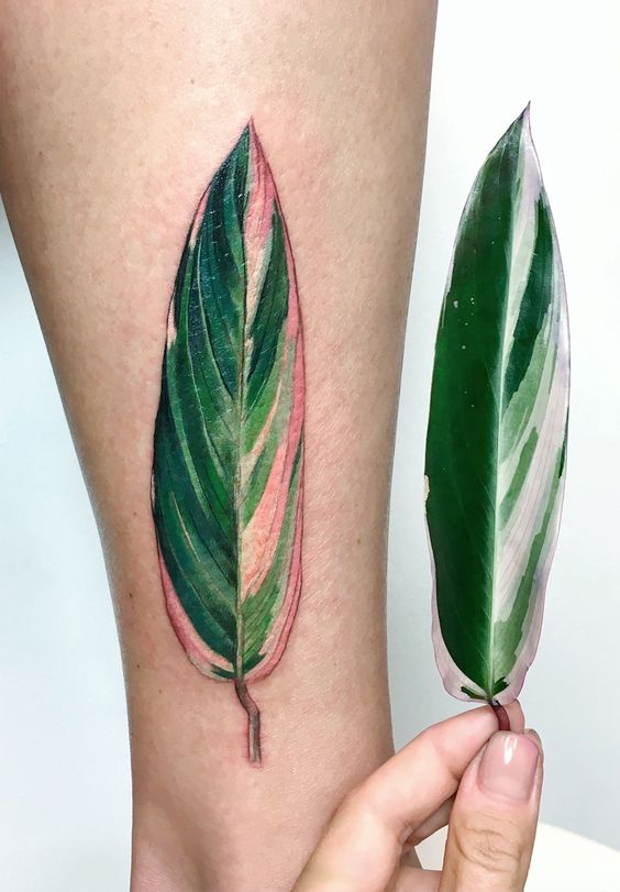 Watercolor green leaf tattoo