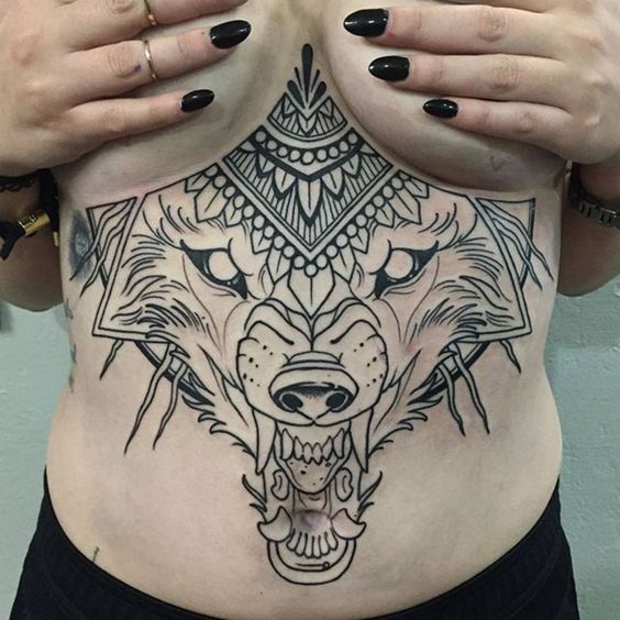 Wolf sternum tattoo