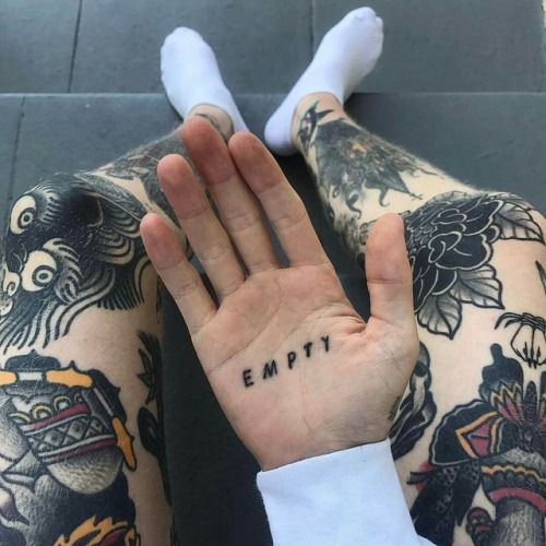 Word empty tattoo on the palm