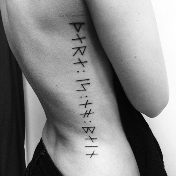 Words there is no pain in runes tattoo on the right side