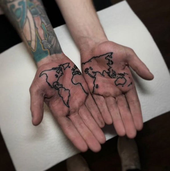 World map tattoo on both palms