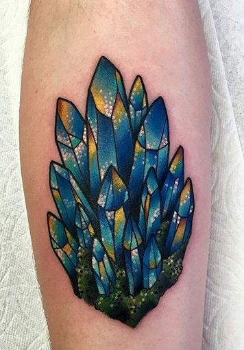 Light blue aura quartz crystal tattoo