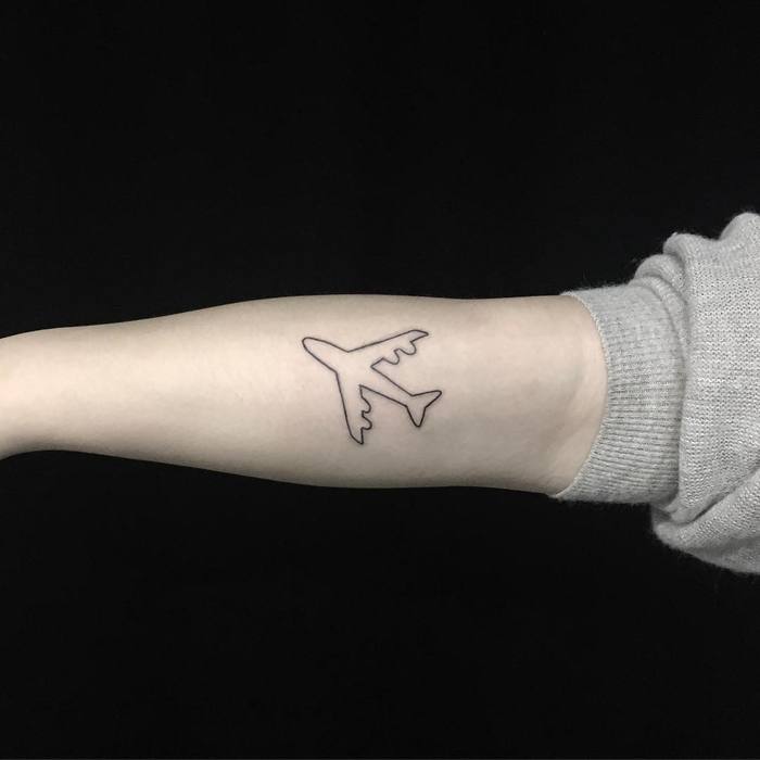Airplane silhouette tattoo